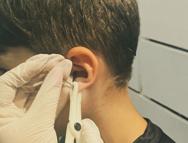 Piercing lobes en douceur